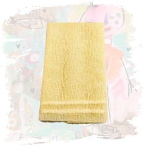 a yellow towel on a table