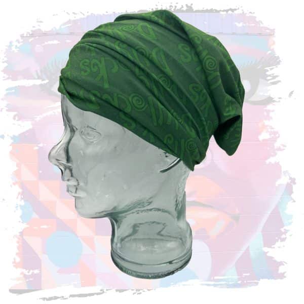 a glass head with a green bandana on it