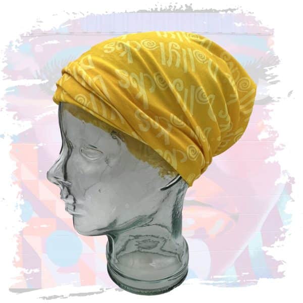 a glass head with a yellow scarf on it